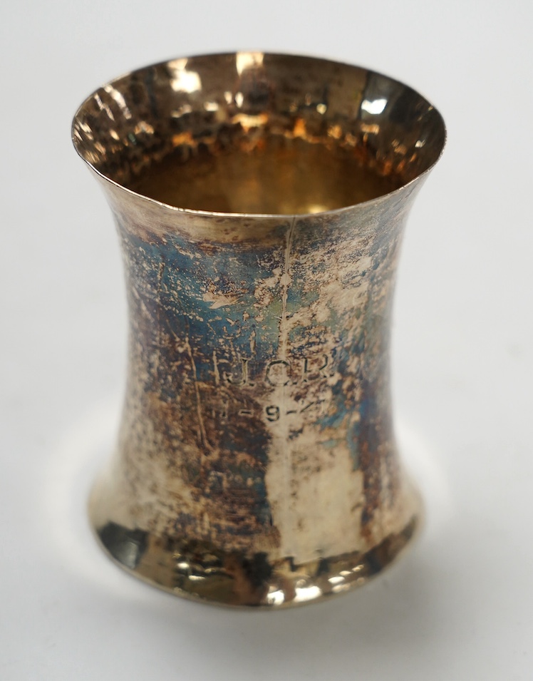 An Elizabeth II Irish planished silver beaker, William Egan & Sons, of waisted form, Dublin, 1964, 88mm, 5oz. Condition - fair.